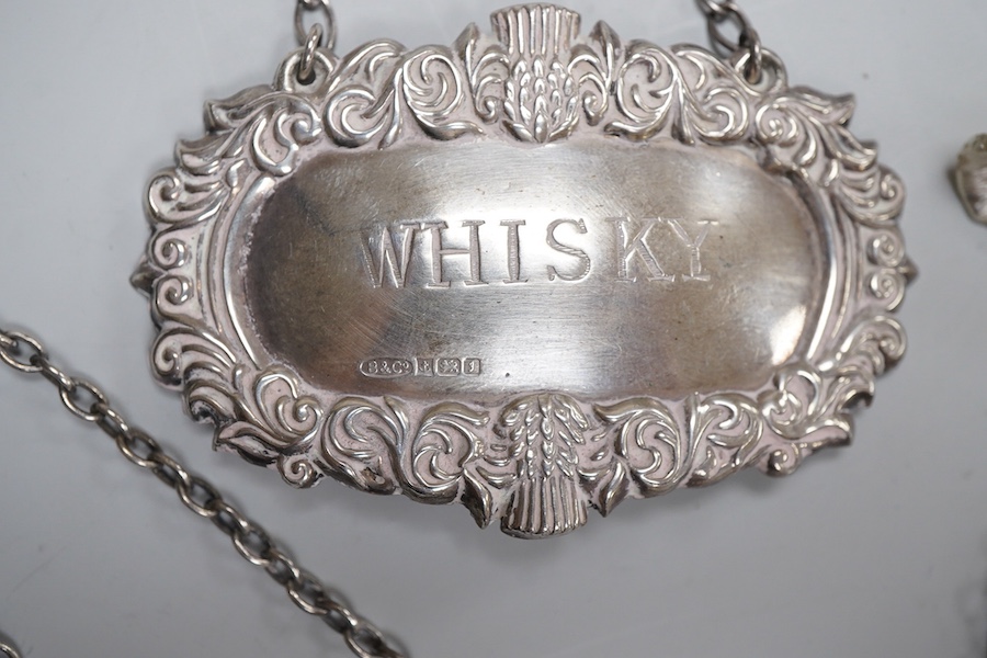 A collection of jewels, comprising: two amber pendants and an amber ring, each mounted in silver; a pair of gilt metal and enamel earrings of floral design; a pair of gilt metal earrings; a silver and cultured brooch; a